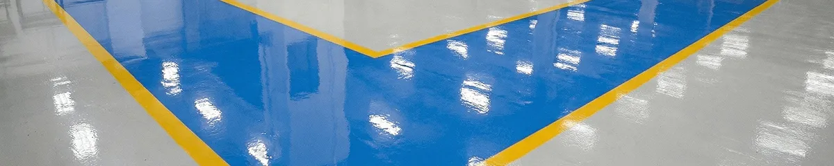 A factory floor professionally covered and marked with epoxy flooring in Dayton, OH