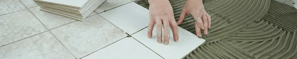 Professional installing white tile floors in Dayton, OH