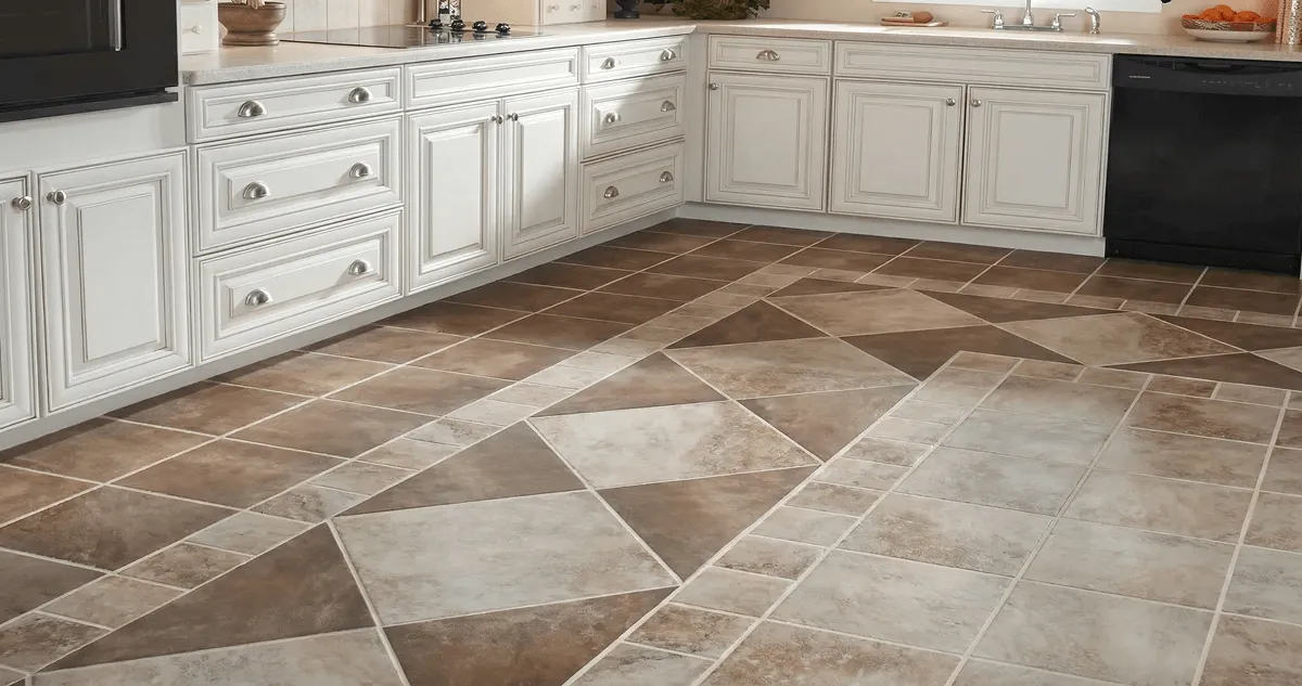 Kitchen with white cabinets and a professionally installed tile floor in Dayton, OH